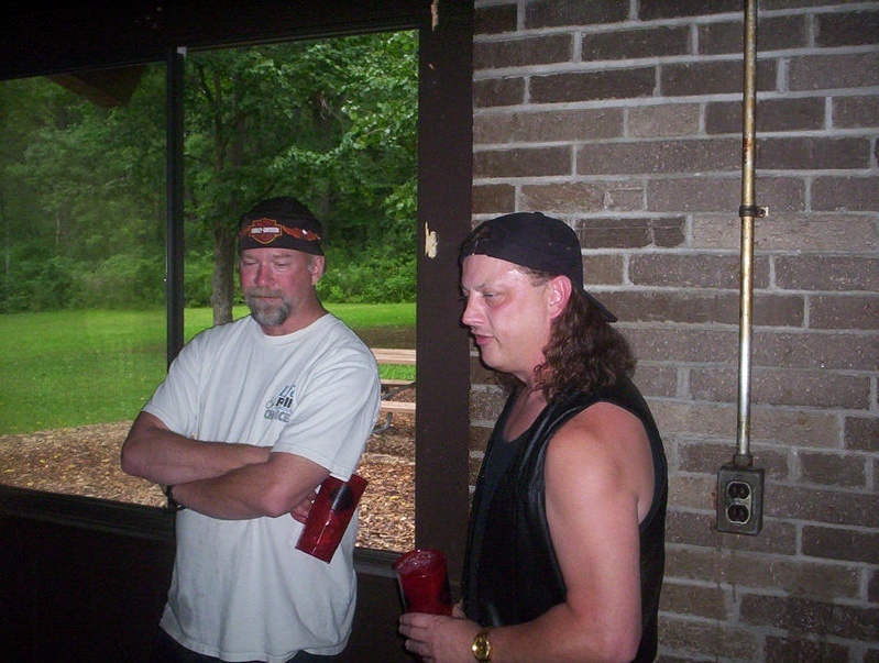 Barry and Bryne deciding which guitar to use